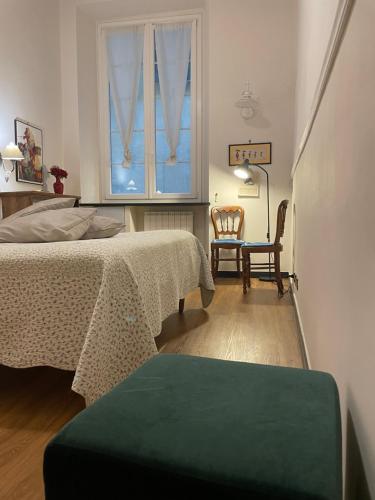 Giường trong phòng chung tại San Lorenzo 21 Apartment