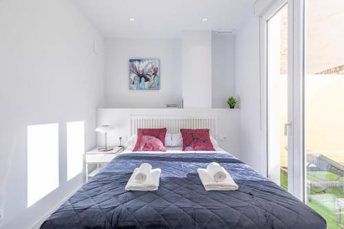 מיטה או מיטות בחדר ב-Gorgeous Apt with a Large Private Terrace