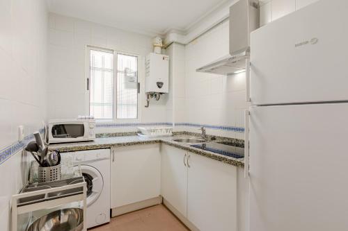 Кухня или мини-кухня в Avanti La Judería, vive Sevilla con los cinco sentidos
