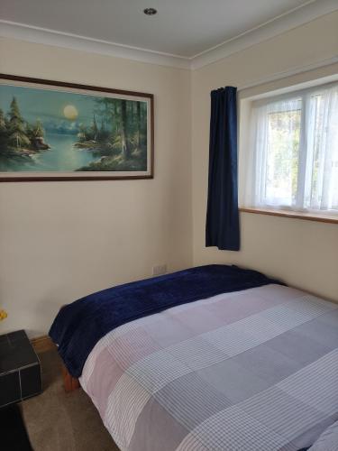 Postel nebo postele na pokoji v ubytování Miriam's Cottage West Cork