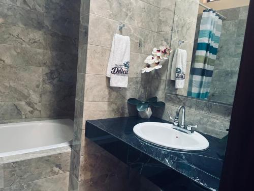 Ванная комната в Hotel Delicias Tequila