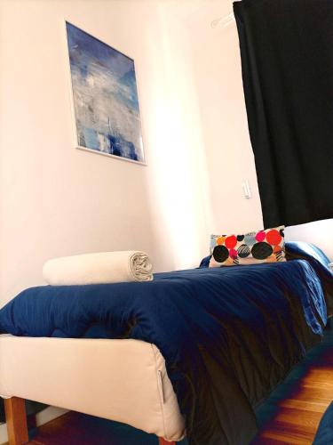 Ένα ή περισσότερα κρεβάτια σε δωμάτιο στο Bluoltremare