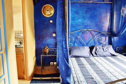 Una cama o camas en una habitación de Riad Anma