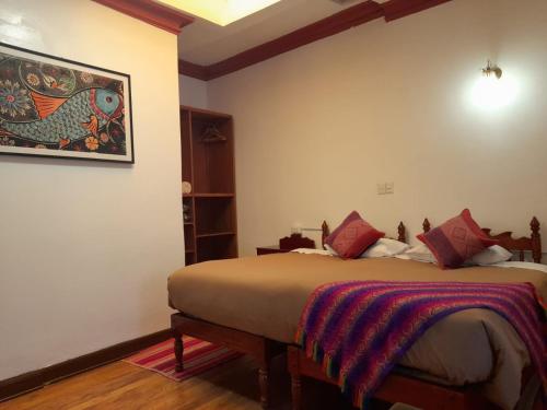 Postel nebo postele na pokoji v ubytování Terra Sagrada Cusco
