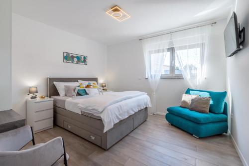 Postel nebo postele na pokoji v ubytování VILLA MIRAKUL