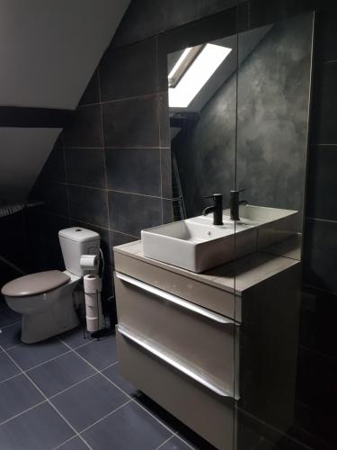 Ένα μπάνιο στο Cosy Lodg