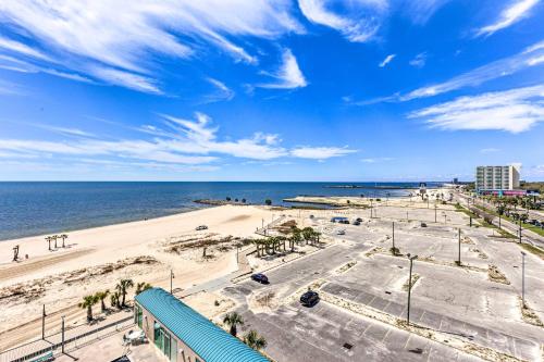 a view of a beach and the ocean on a sunny day at Spacious Biloxi Getaway with Pools and Beach Access! in Biloxi