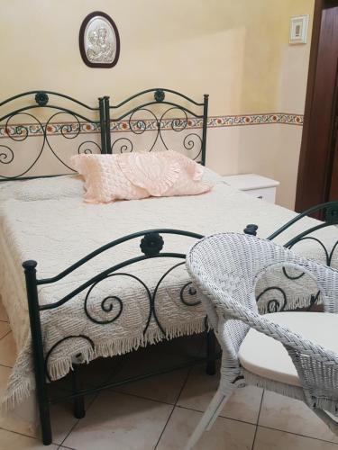 Postel nebo postele na pokoji v ubytování La casa di Antonella