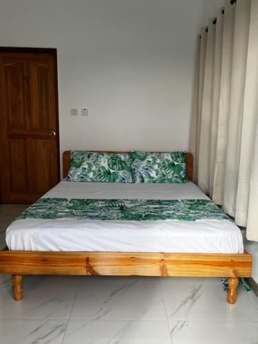 Ένα ή περισσότερα κρεβάτια σε δωμάτιο στο Western Ocean Breeze Self Catering