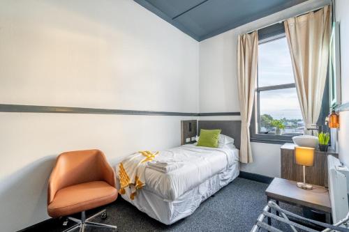 Letto o letti in una camera di Railway Hotel