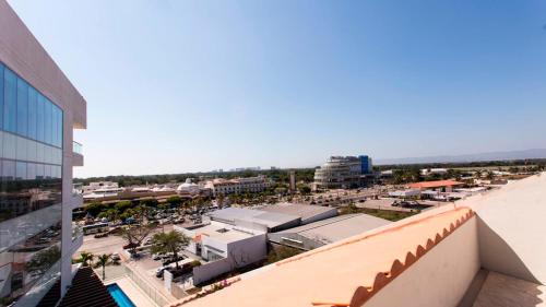 a view of a city from the top of a building at Holiday Inn Express Puerto Vallarta by IHG in Puerto Vallarta