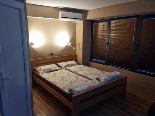 En eller flere senger på et rom på Skopje Apartment