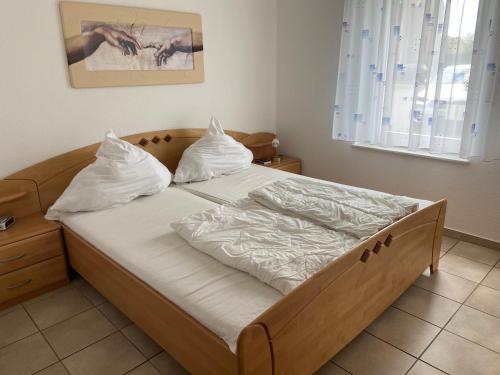 Postel nebo postele na pokoji v ubytování Tomke - Kolk 30