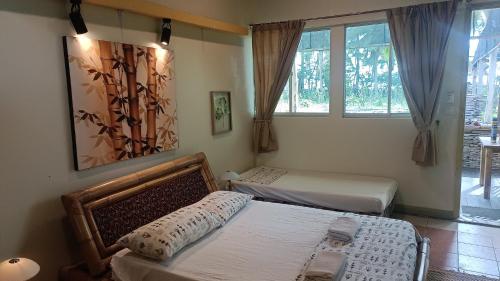 Voodi või voodid majutusasutuse GreenHouse EcoLodge toas