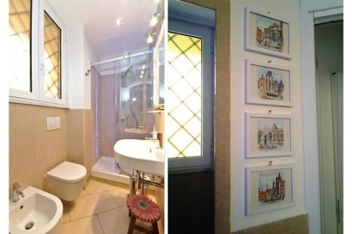 La salle de bains est pourvue d'un lavabo, de toilettes et d'une fenêtre. dans l'établissement Roma Borgo91, à Rome