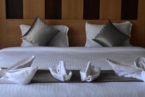Postel nebo postele na pokoji v ubytování Hotel Ridley International