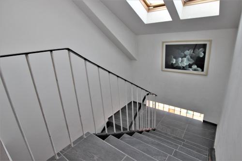 a staircase in a house with a skylight at A.B. Hotel in Erlangen