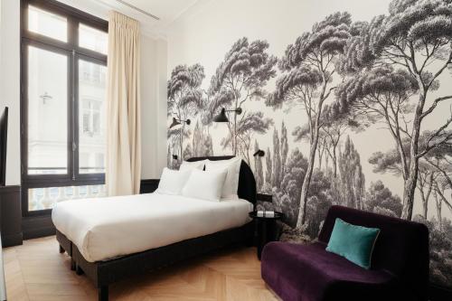 Ένα ή περισσότερα κρεβάτια σε δωμάτιο στο My Maison In Paris Invalides