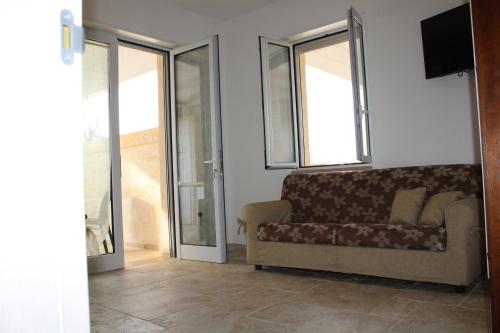 Χώρος καθιστικού στο Ricciolandia Suites
