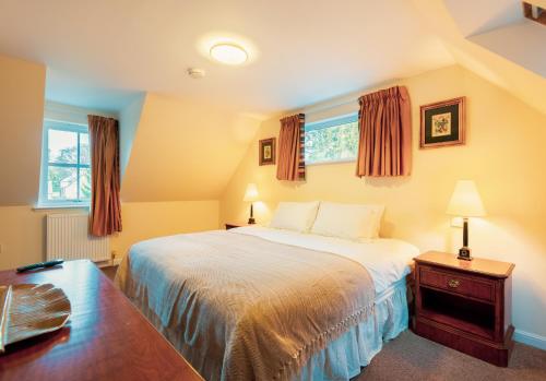 מיטה או מיטות בחדר ב-Pink Spa Nest