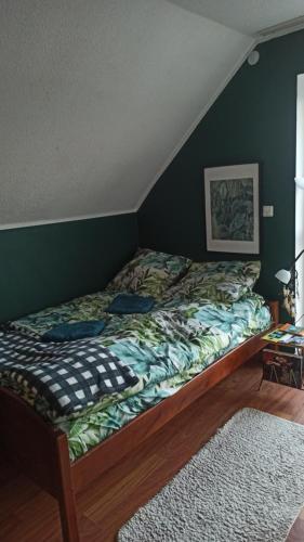 Posteľ alebo postele v izbe v ubytovaní Dom na Górce