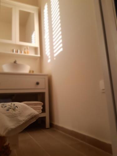 Łóżko lub łóżka w pokoju w obiekcie La Casetta di Gloria