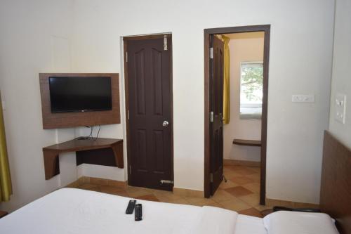 Postel nebo postele na pokoji v ubytování River Valley Resort
