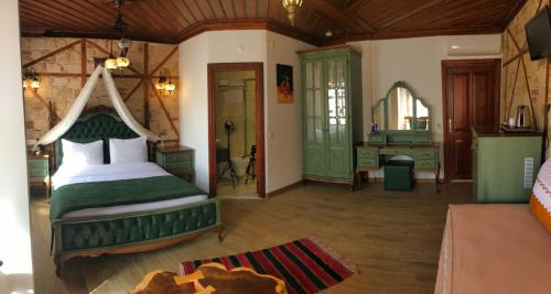 a bedroom with a large bed in a room at White Garden Hotel-Adult Only in Antalya