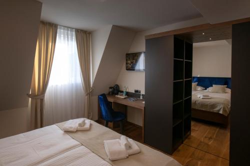 Postel nebo postele na pokoji v ubytování Resort Una Park