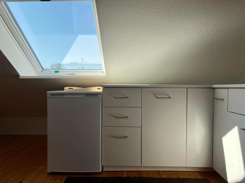 an office with a desk and a window at Westfälischer Hof - Loft in Lehnin