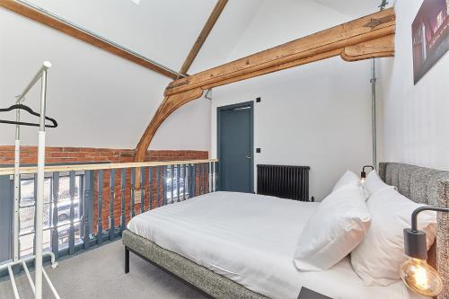 Postel nebo postele na pokoji v ubytování No 4 at Simpson Street Apartments Sunderland