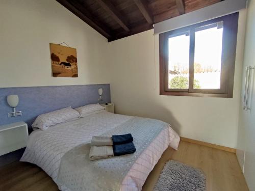 Un pat sau paturi într-o cameră la Casa Barros