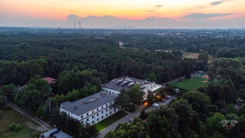an aerial view of a building in the forest at Klub Sosnowy in Warsaw