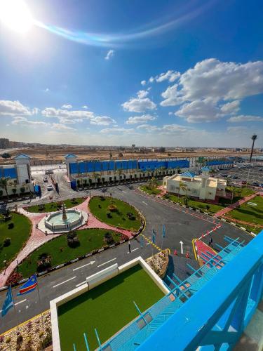 a view of a parking lot with a park at The Guard Hotel in Cairo