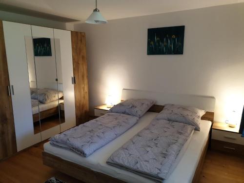 Postel nebo postele na pokoji v ubytování Ferienwohnung Suppan