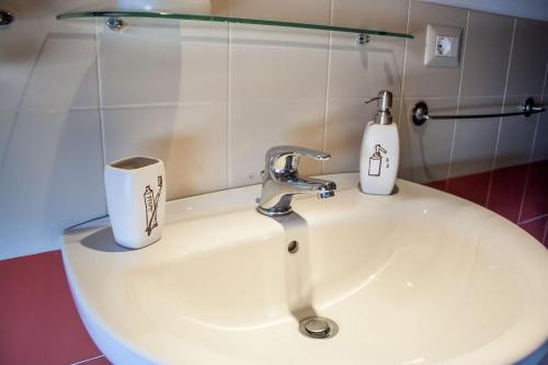 Koupelna v ubytování Le Coccole