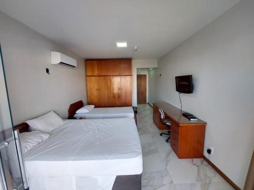 Cama o camas de una habitación en Garvey Apart Hotel