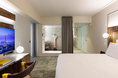 Katil atau katil-katil dalam bilik di Pullman Paris Montparnasse