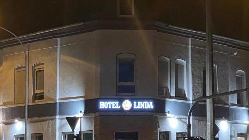 a building with a sign that reads hotel luana at Hotel Linda in Gladbeck