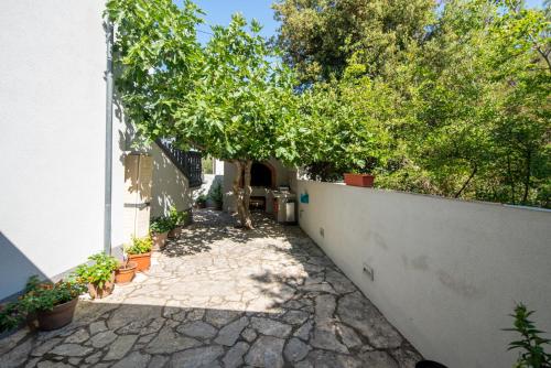 Zahrada ubytování Apartmani Di-Ana