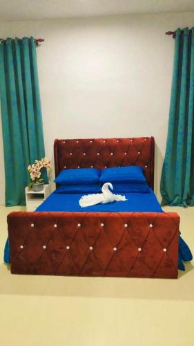 Postel nebo postele na pokoji v ubytování HomeStaytion@Semenyih