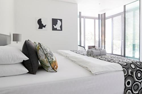 Postel nebo postele na pokoji v ubytování Bayview Boutique Guesthouse