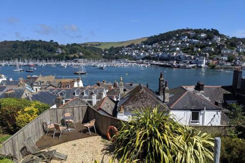 a view of a harbor with boats in the water at Kittiwake - Outstanding River Views in Dartmouth