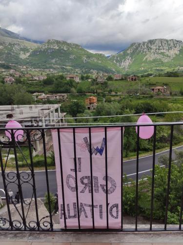 a balcony with a view of a road and mountains at Affittacamere Arco Antico in Cusano Mutri