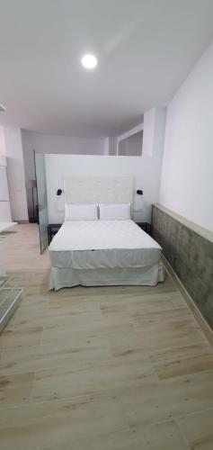 Katil atau katil-katil dalam bilik di LOFT APARTAMENTo