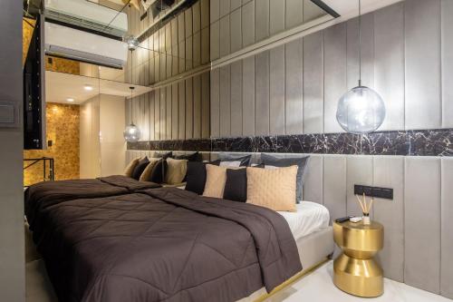 Posteľ alebo postele v izbe v ubytovaní Super-Apartamenty VIP Jacuzzi II