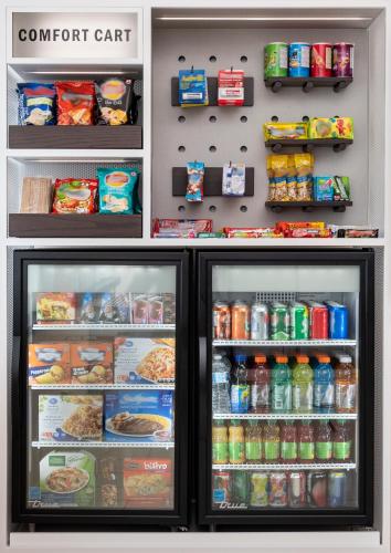 a refrigerator full of food and drinks at Comfort Inn in Sault Ste. Marie