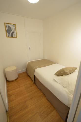 Katil atau katil-katil dalam bilik di Demeures & Châteaux - Hôtel de la porte Saint-Malo - DINAN