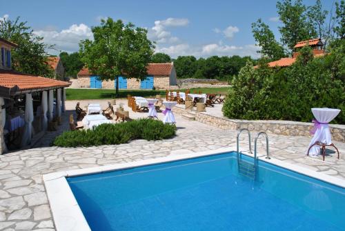 The swimming pool at or close to Country House Marića Gaj
