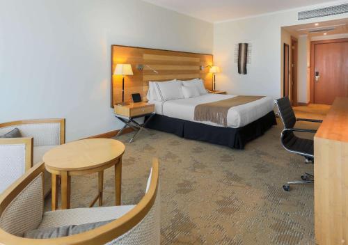 Cama o camas de una habitación en Sonesta Hotel Osorno